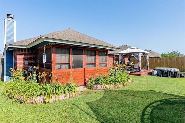 1408 Eagle Dr, Moore, OK 73160 - rear view of property with a gazebo, brick siding, a chimney, and a shingled roof