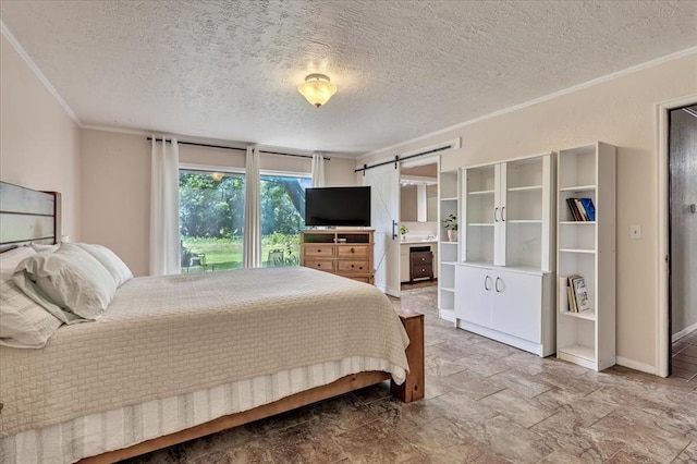 2122 Edinburg Dr, Yukon, OK 73099 - bedroom with crown molding, a textured ceiling, light stone finish floors, and a barn door