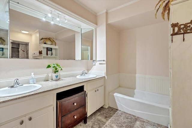2122 Edinburg Dr, Yukon, OK 73099 - bathroom with double vanity, a bath, and ornamental molding