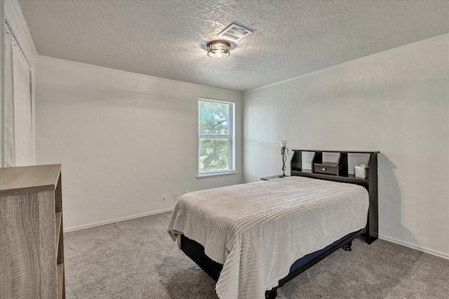 2122 Edinburg Dr, Yukon, OK 73099 - carpeted bedroom featuring a textured ceiling and baseboards