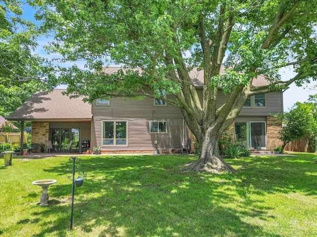2122 Edinburg Dr, Yukon, OK 73099 - rear view of property featuring brick siding