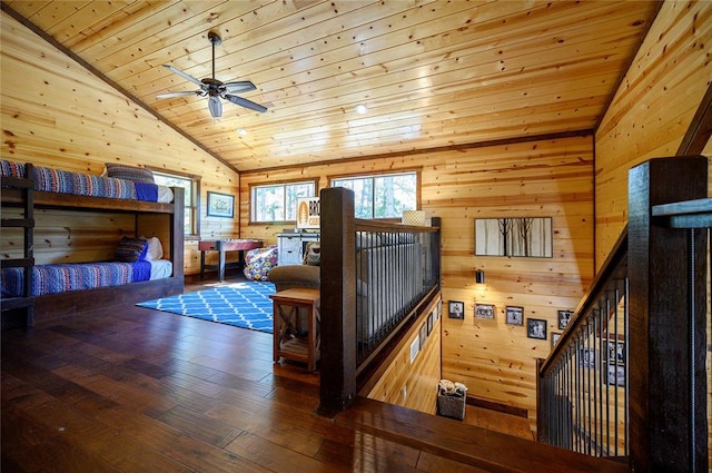36 Spruce Ct, Broken Bow, OK 74728 - bedroom with lofted ceiling, wood walls, hardwood / wood-style flooring, and wood ceiling