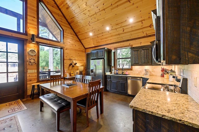 36 Spruce Ct, Broken Bow, OK 74728 - dining space with finished concrete flooring, wooden ceiling, high vaulted ceiling, wooden walls, and recessed lighting