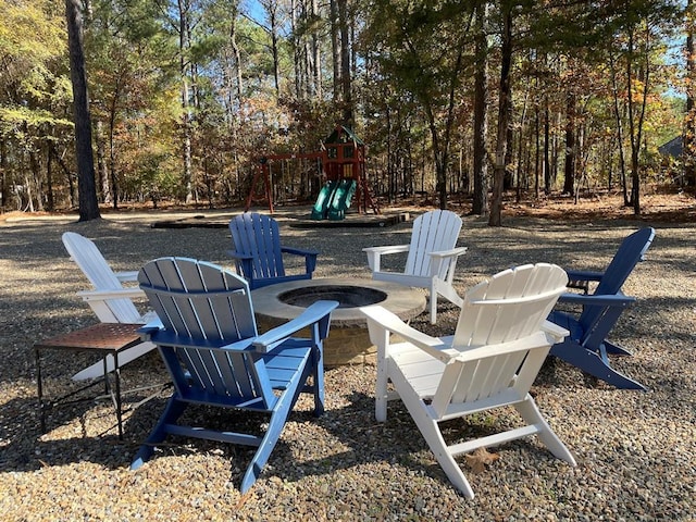 36 Spruce Ct, Broken Bow, OK 74728 - view of patio / terrace featuring a fire pit and a playground