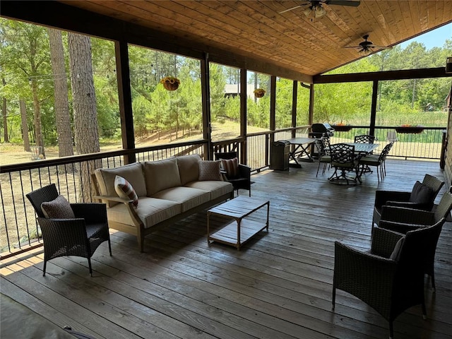 36 Spruce Ct, Broken Bow, OK 74728 - sunroom with ceiling fan, an outdoor living space, outdoor dining area, and vaulted ceiling