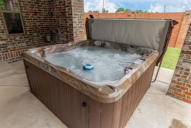 1505 SW 113th Pl, Oklahoma City, OK 73170 - view of patio featuring a hot tub