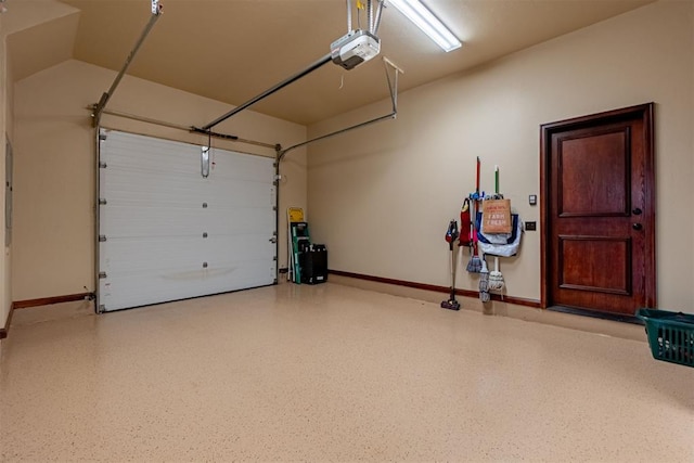 1505 SW 113th Pl, Oklahoma City, OK 73170 - garage featuring baseboards and a garage door opener