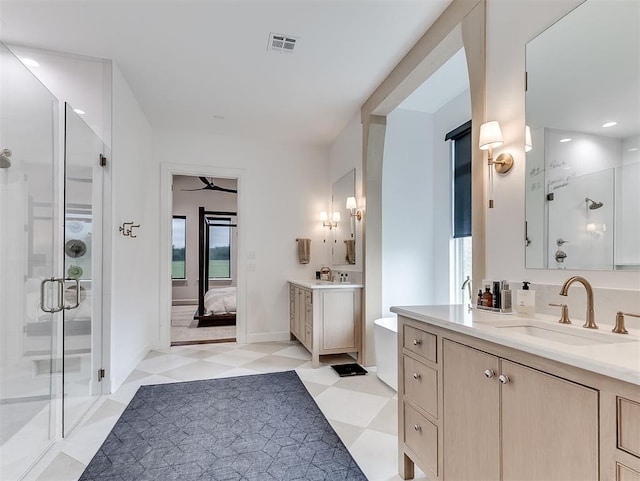 2917 Piazza Ct, Arcadia, OK 73007 - ensuite bathroom with a shower stall, tile patterned floors, and two vanities