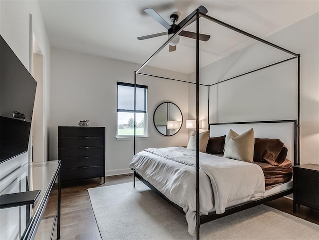 2917 Piazza Ct, Arcadia, OK 73007 - bedroom featuring wood finished floors and ceiling fan