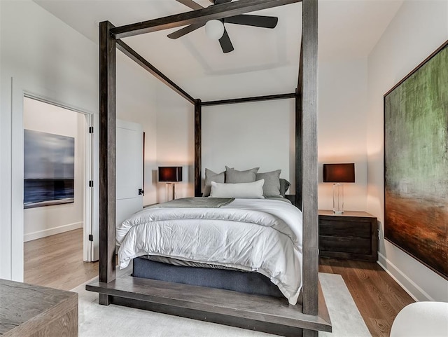 2917 Piazza Ct, Arcadia, OK 73007 - bedroom with wood finished floors and a ceiling fan