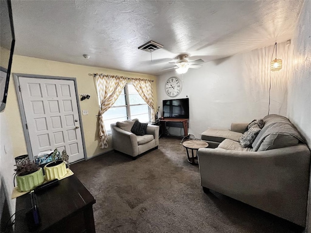 6338 Norman Rd, Warr Acres, OK 73122 - living room with a ceiling fan and dark colored carpet