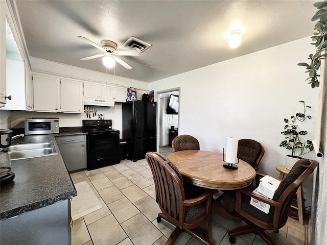 6338 Norman Rd, Warr Acres, OK 73122 - dining room featuring ceiling fan and light tile patterned floors
