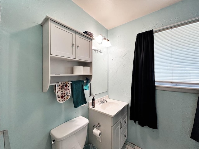 6338 Norman Rd, Warr Acres, OK 73122 - bathroom featuring vanity and toilet