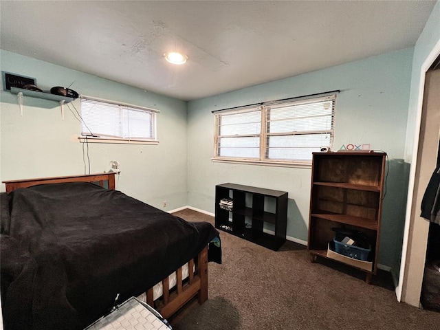 6338 Norman Rd, Warr Acres, OK 73122 - carpeted bedroom featuring baseboards