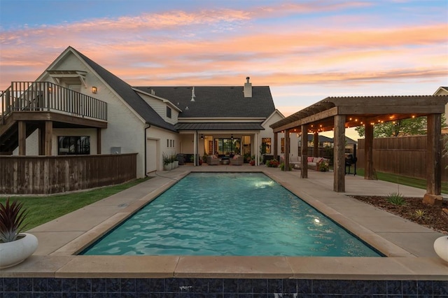 4504 SE 41st St, Moore, OK 73165 - view of swimming pool with an outdoor hangout area, a fenced backyard, a patio area, a pergola, and a ceiling fan