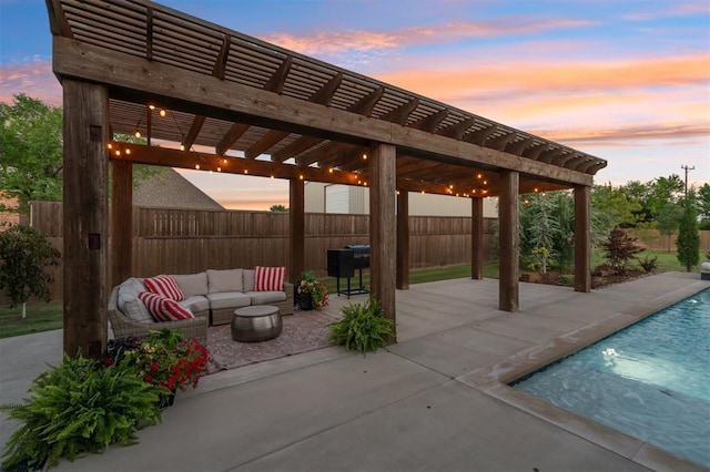 4504 SE 41st St, Moore, OK 73165 - patio terrace at dusk featuring a pergola, a patio area, and outdoor lounge area