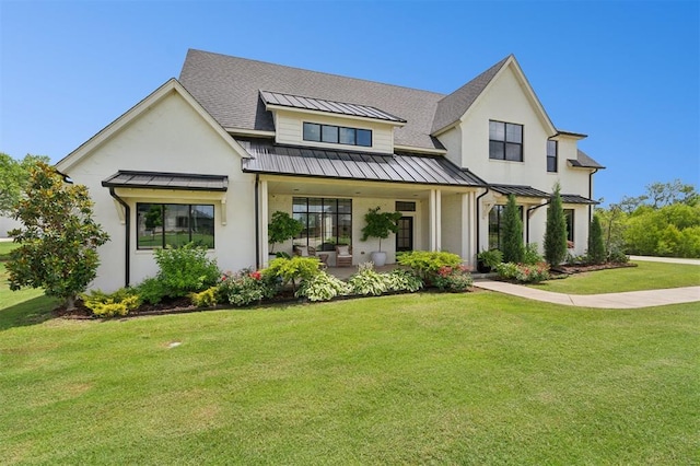 4504 SE 41st St, Moore, OK 73165 - modern inspired farmhouse featuring a standing seam roof, a metal roof, and a front yard