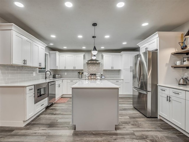 10505 Lyndon Rd, The Village, OK 73120 - kitchen with appliances with stainless steel finishes, light countertops, white cabinetry, recessed lighting, and open shelves