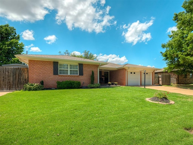 10505 Lyndon Rd, The Village, OK 73120 - ranch-style house featuring an attached garage, concrete driveway, and brick siding