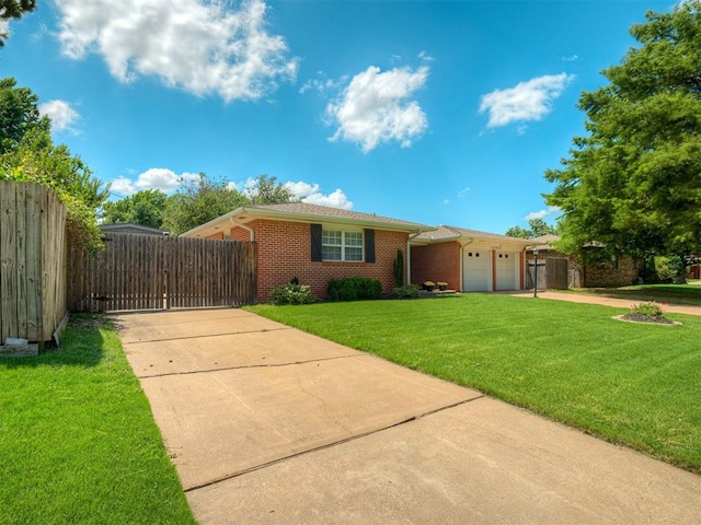 10505 Lyndon Rd, The Village, OK 73120 - ranch-style house with concrete driveway, a gate, an attached garage, and brick siding