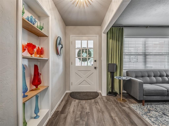 10505 Lyndon Rd, The Village, OK 73120 - entryway featuring wood finished floors and baseboards