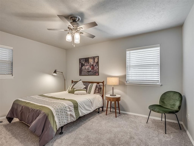 10505 Lyndon Rd, The Village, OK 73120 - bedroom with carpet, a ceiling fan, and a textured ceiling