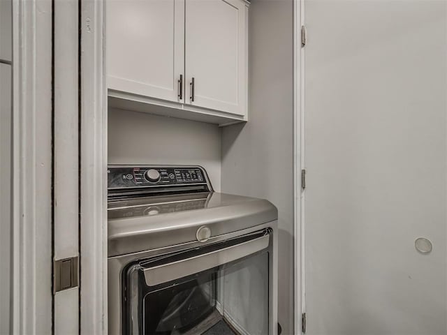 10505 Lyndon Rd, The Village, OK 73120 - laundry area featuring washer / clothes dryer and cabinet space