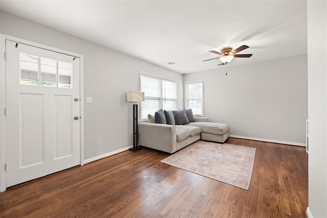 1817 Westchester Dr, Oklahoma City, OK 73120 - living area featuring ceiling fan and dark wood-style flooring