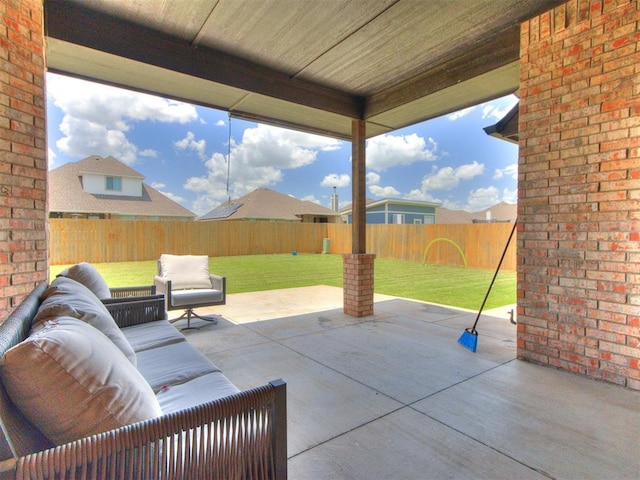 701 Bison Crossing Dr, Yukon, OK 73099 - fenced backyard with a patio area