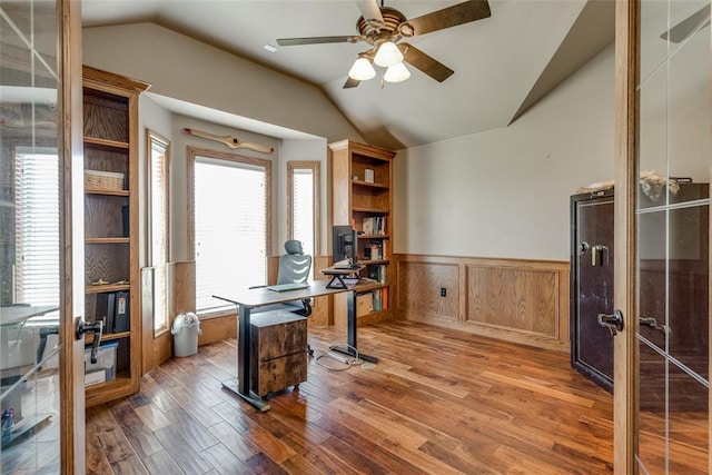 2858 Fields Rd, El Reno, OK 73036 - office area featuring lofted ceiling, wood finished floors, wainscoting, french doors, and ceiling fan