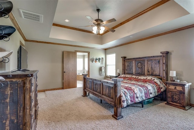 2858 Fields Rd, El Reno, OK 73036 - bedroom with carpet, crown molding, a raised ceiling, ceiling fan, and ensuite bath