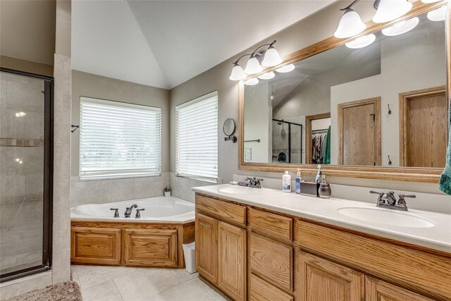 2858 Fields Rd, El Reno, OK 73036 - full bath with lofted ceiling, a shower stall, double vanity, a bath, and tile patterned floors