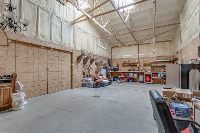 2858 Fields Rd, El Reno, OK 73036 - garage featuring a workshop area
