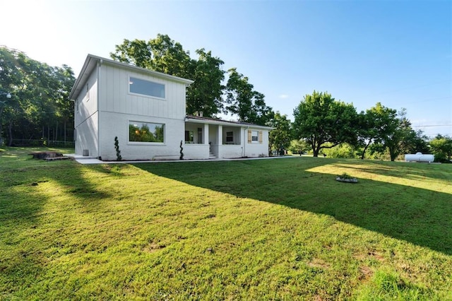 8300 S Anderson Rd, Oklahoma City, OK 73150 - back of house with a lawn
