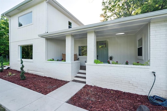 8300 S Anderson Rd, Oklahoma City, OK 73150 - view of front facade with covered porch and brick siding