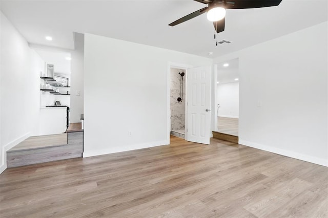 8300 S Anderson Rd, Oklahoma City, OK 73150 - empty room featuring a ceiling fan, light wood-type flooring, and recessed lighting