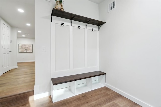 8300 S Anderson Rd, Oklahoma City, OK 73150 - mudroom with wood finished floors and recessed lighting
