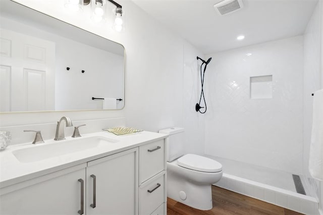 8300 S Anderson Rd, Oklahoma City, OK 73150 - full bathroom with vanity, a walk in shower, and wood finished floors