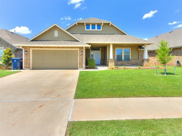 6713 NW 149th St, Oklahoma City, OK 73142 - view of front of property with a garage, concrete driveway, a front yard, a shingled roof, and brick siding