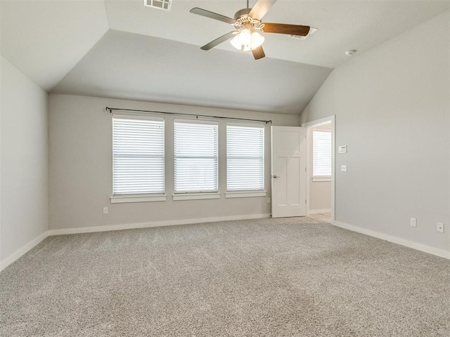 6713 NW 149th St, Oklahoma City, OK 73142 - spare room with lofted ceiling, a ceiling fan, healthy amount of natural light, carpet floors, and a smoke detector