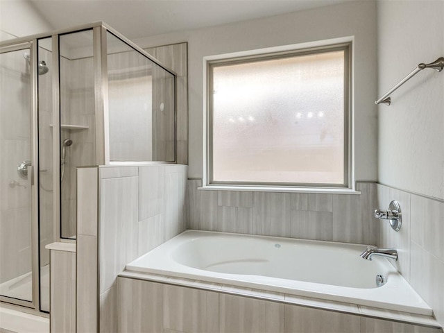 6713 NW 149th St, Oklahoma City, OK 73142 - bathroom featuring a stall shower and a bath