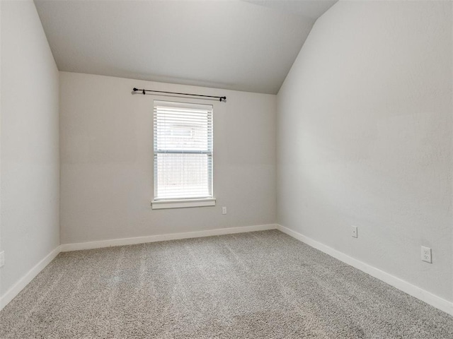 6713 NW 149th St, Oklahoma City, OK 73142 - empty room with lofted ceiling and carpet floors