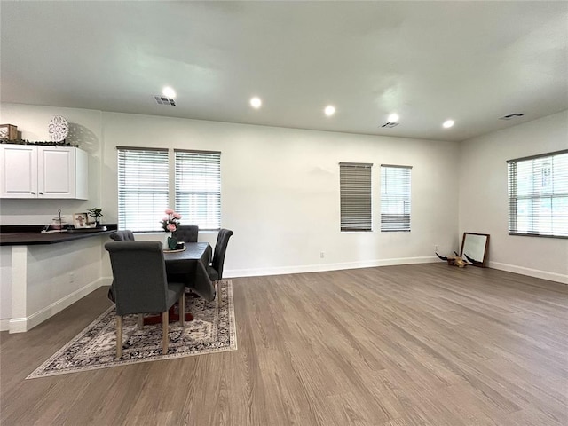 213 W 5th St, Stroud, OK 74079 - dining area featuring wood finished floors and recessed lighting