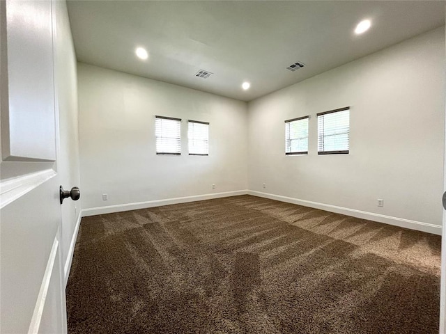 213 W 5th St, Stroud, OK 74079 - unfurnished room with dark colored carpet and recessed lighting