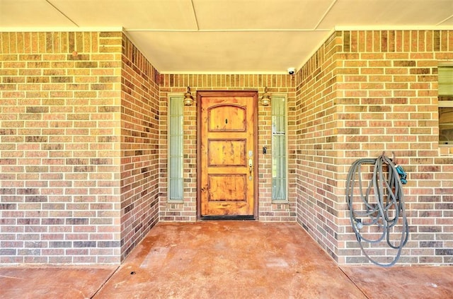 1187 County St Unit 2976, Blanchard, OK 73010 - doorway to property featuring brick siding and a surveillance system
