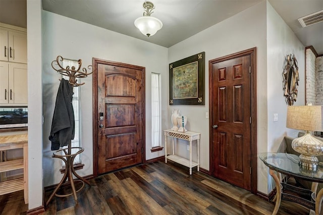 1187 County St Unit 2976, Blanchard, OK 73010 - foyer featuring dark wood-type flooring and baseboards