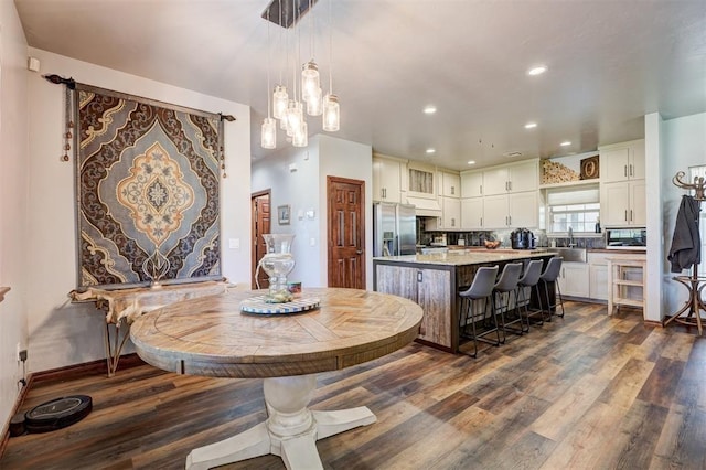 1187 County St Unit 2976, Blanchard, OK 73010 - dining space featuring dark wood-style floors, recessed lighting, and a chandelier