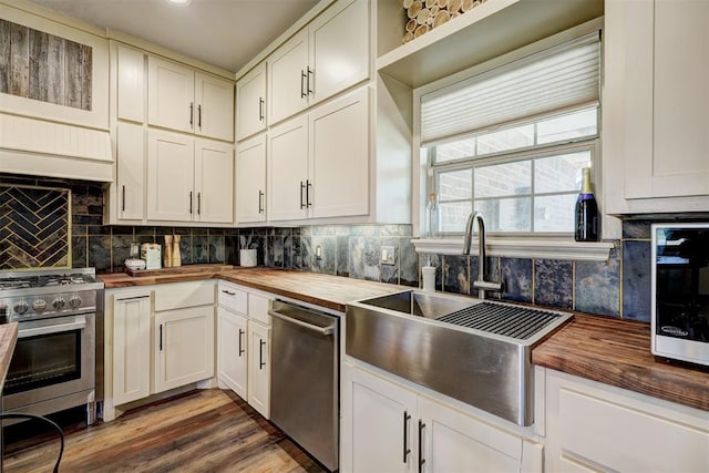 1187 County St Unit 2976, Blanchard, OK 73010 - kitchen featuring butcher block countertops, stainless steel appliances, and backsplash