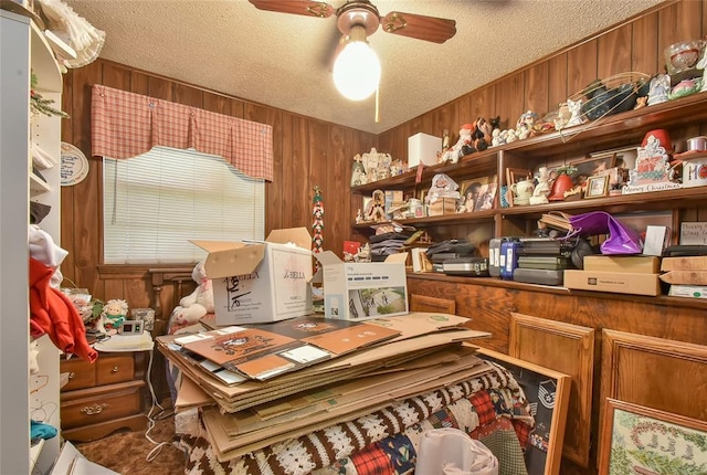 5505 S Dimple Dr, Oklahoma City, OK 73135 - home office with wooden walls, a textured ceiling, and ceiling fan