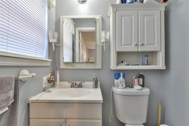 5505 S Dimple Dr, Oklahoma City, OK 73135 - bathroom with vanity and a textured wall